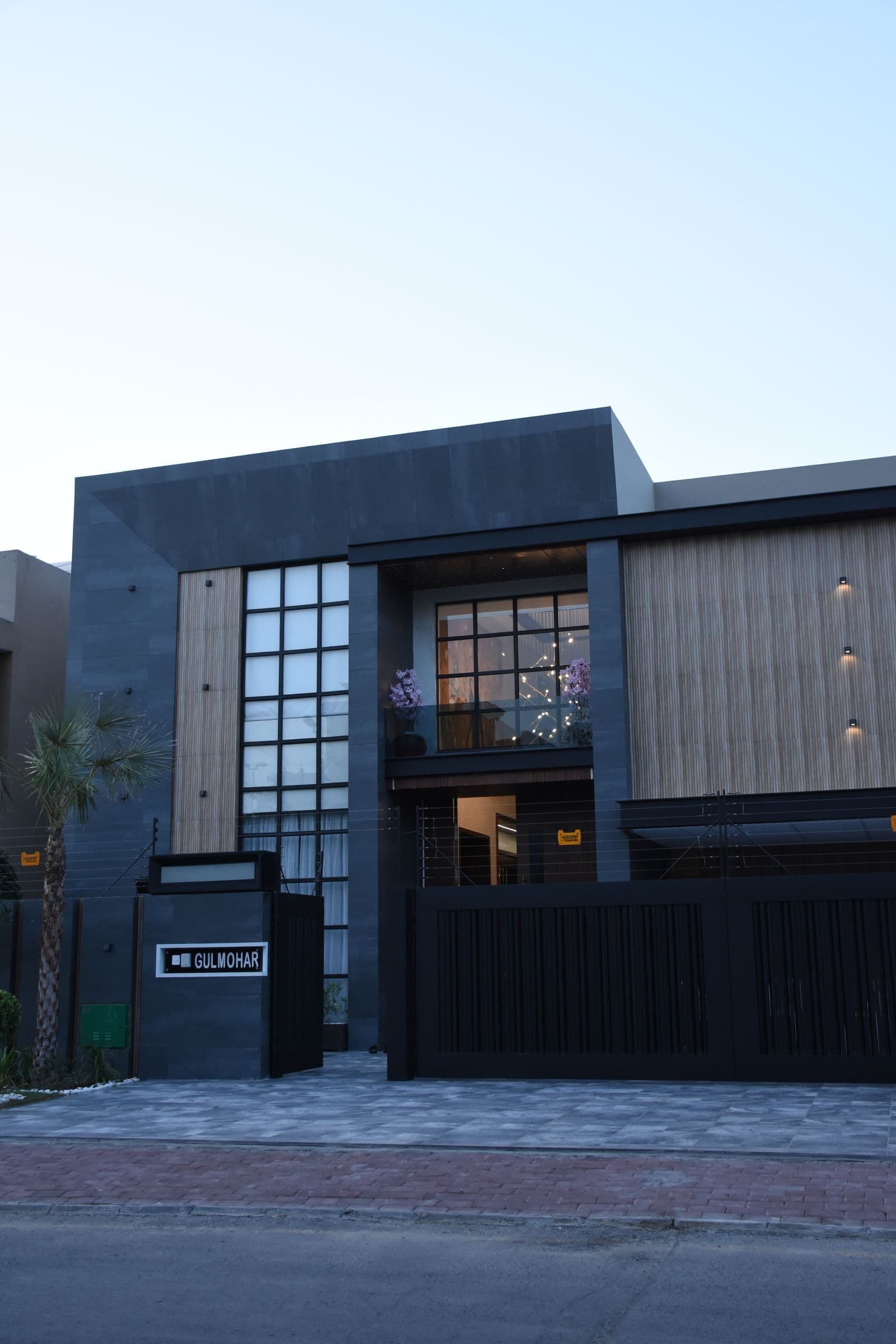A securely gated Pakistani home, guarded entry